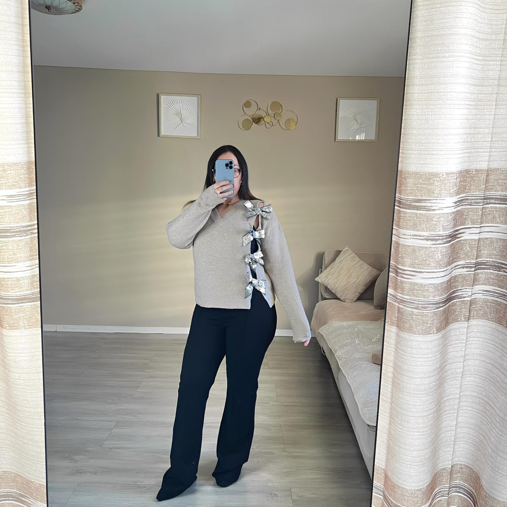 Pull en jersey avec nœud et paillettes