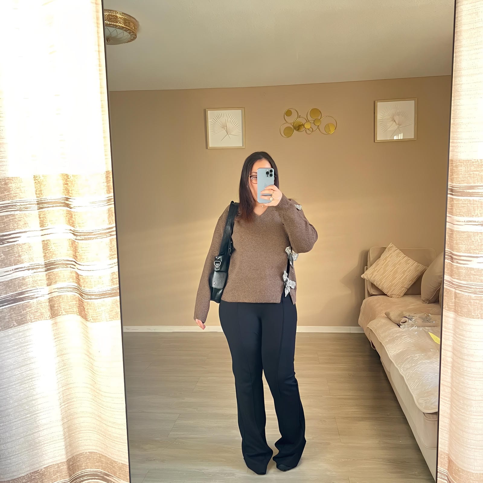 Pull en jersey avec nœud et paillettes