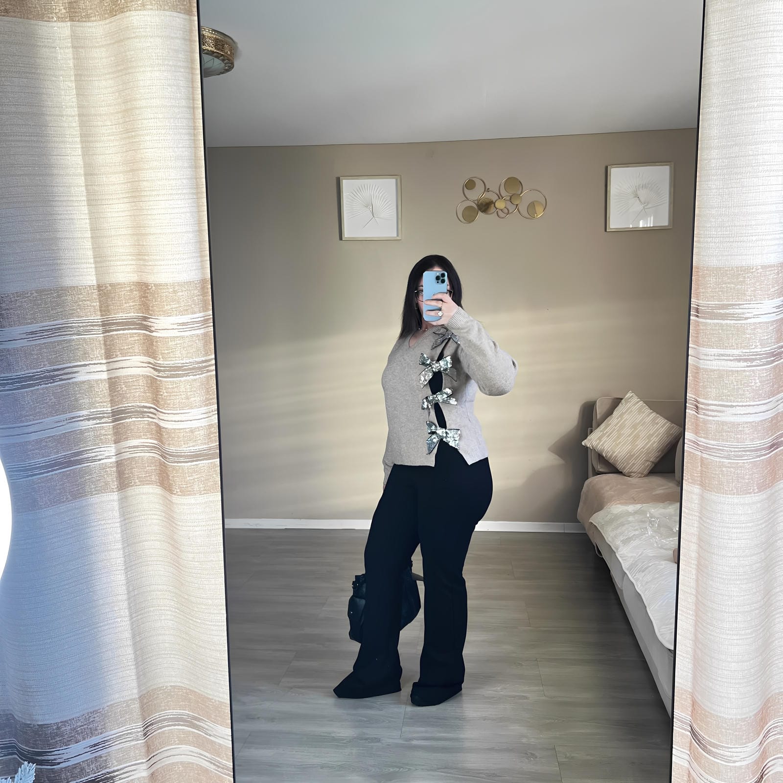 Pull en jersey avec nœud et paillettes