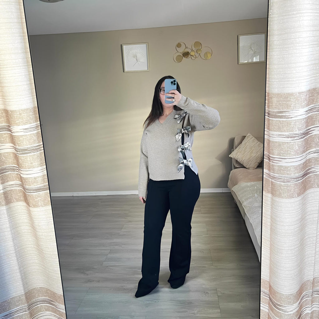 Pull en jersey avec nœud et paillettes
