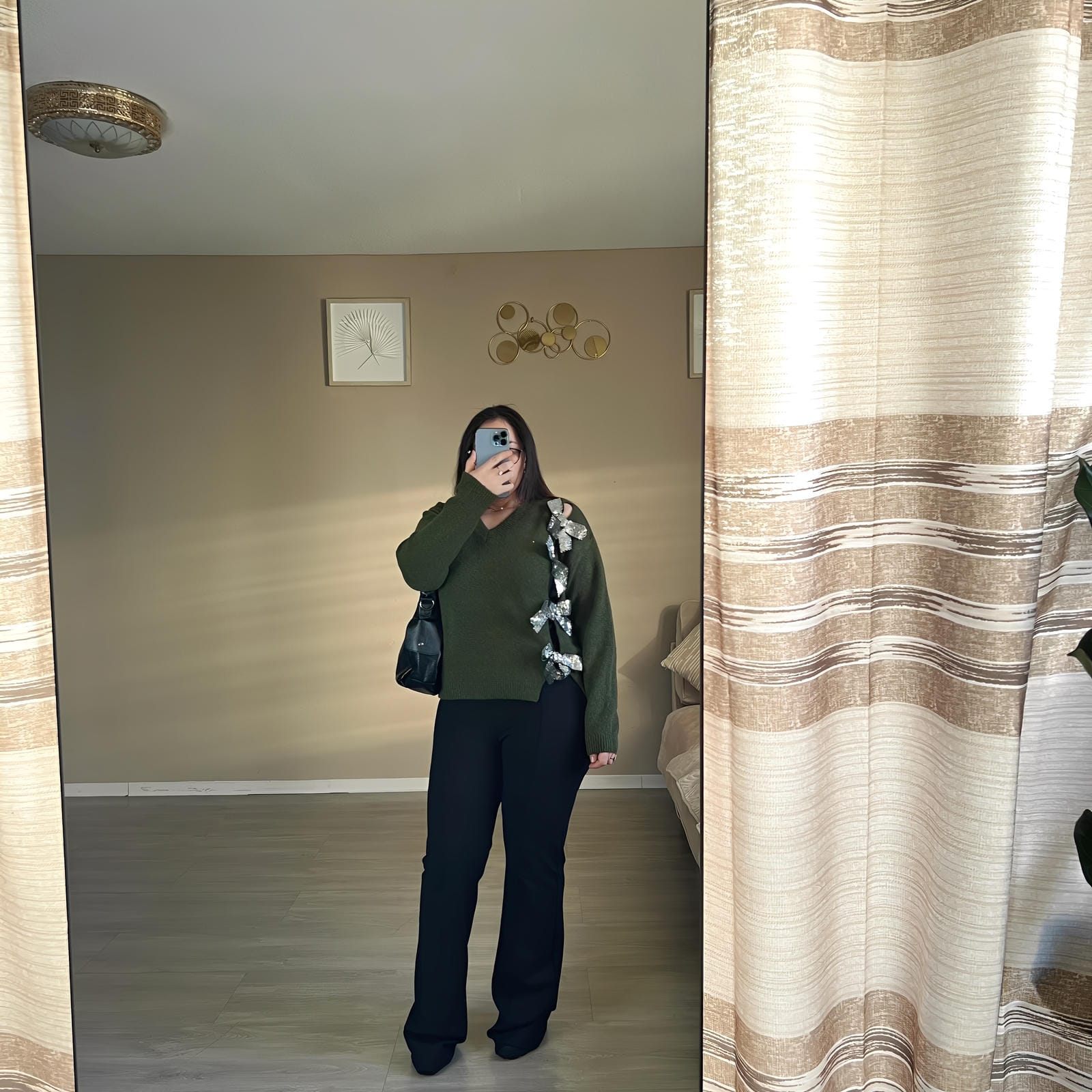 Pull en jersey avec nœud et paillettes