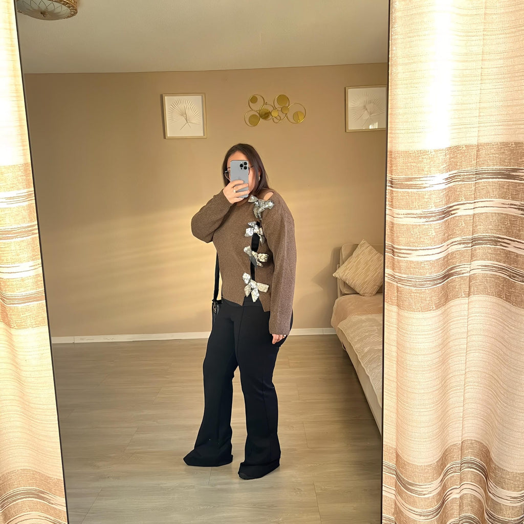 Pull en jersey avec nœud et paillettes